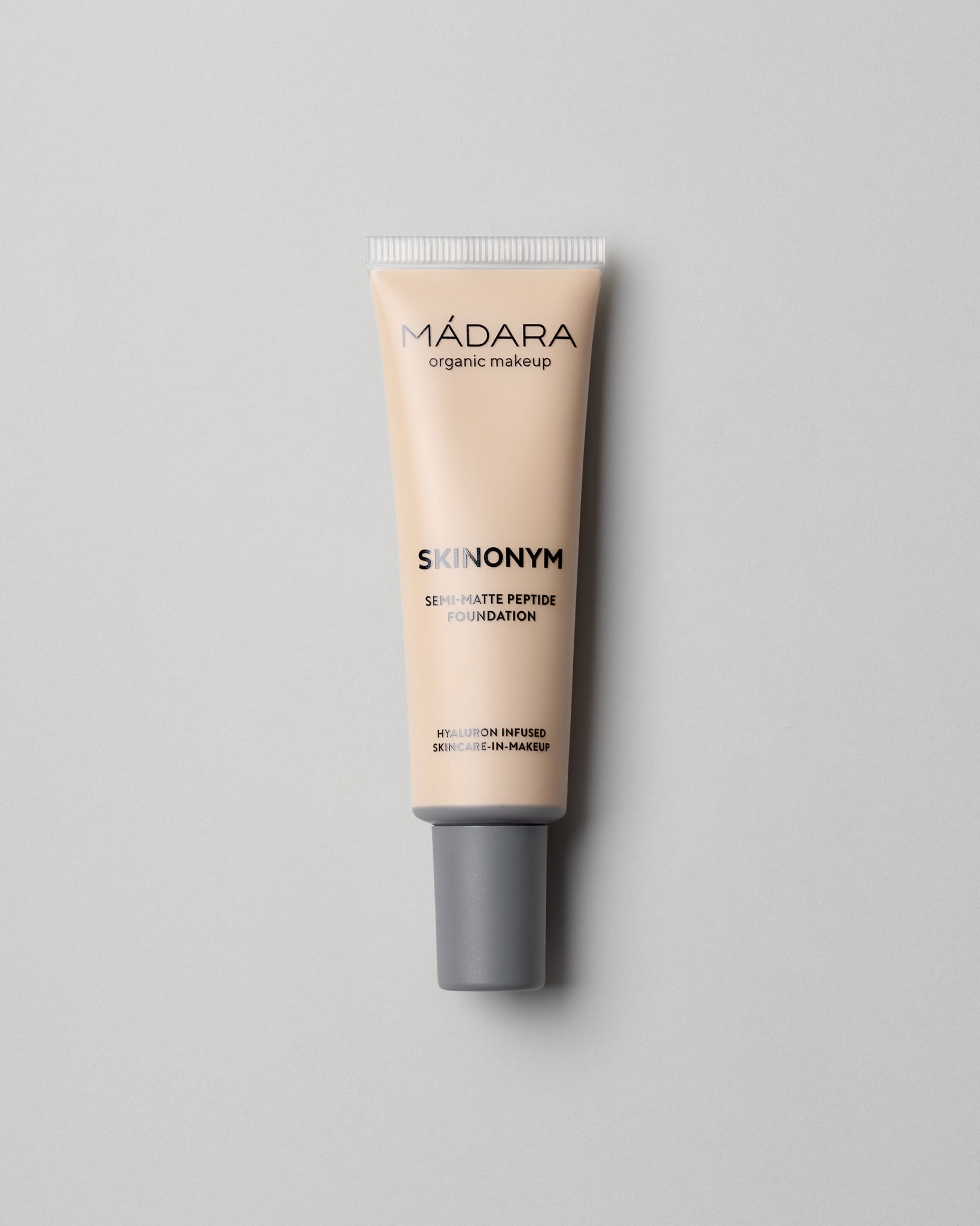 MÁDARA Organic Skincare skinonym foundation stone A6087 foundation product photo on plain background.