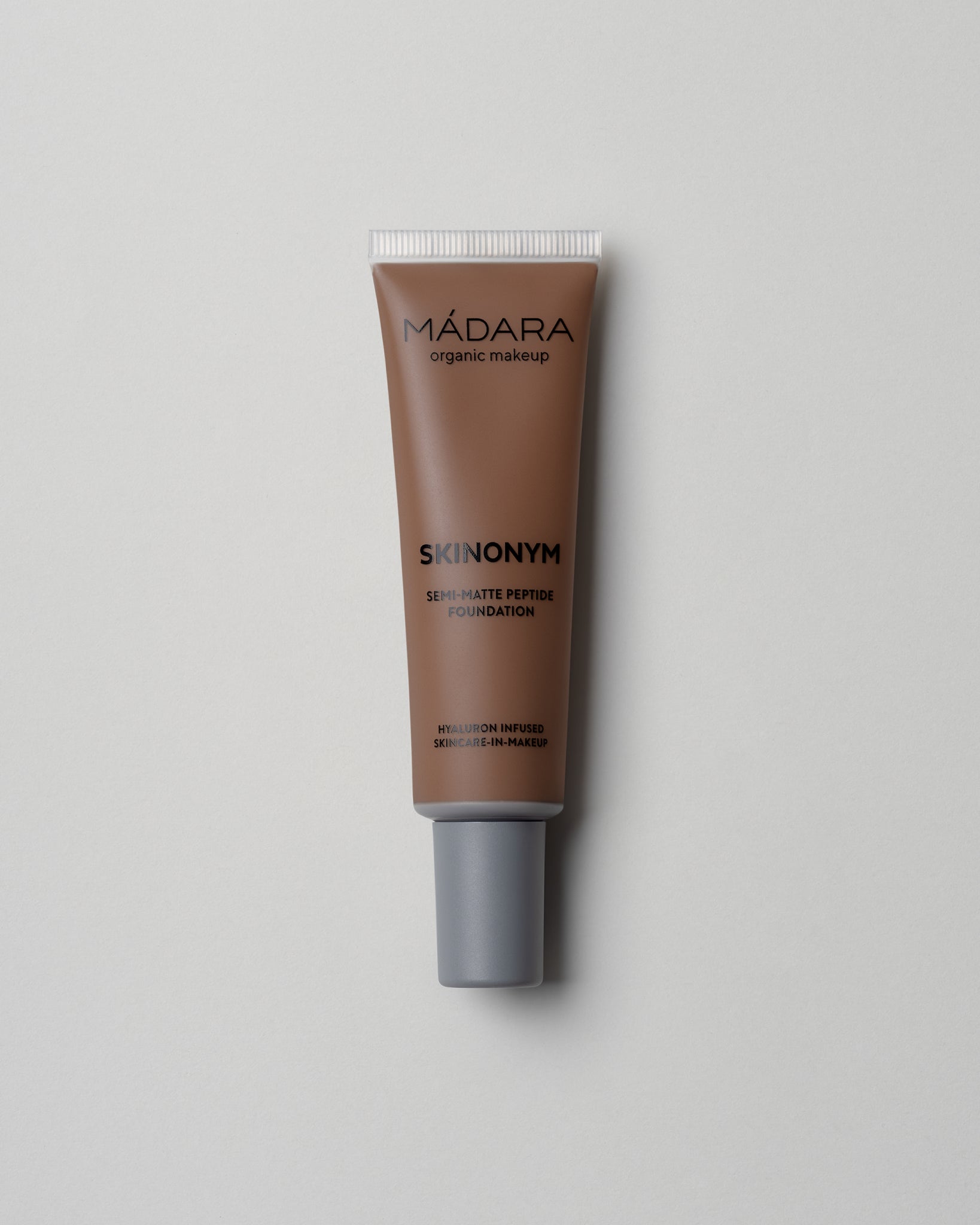 MÁDARA Organic Skincare skinonym foundation umber A6096 foundation product photo on plain background.