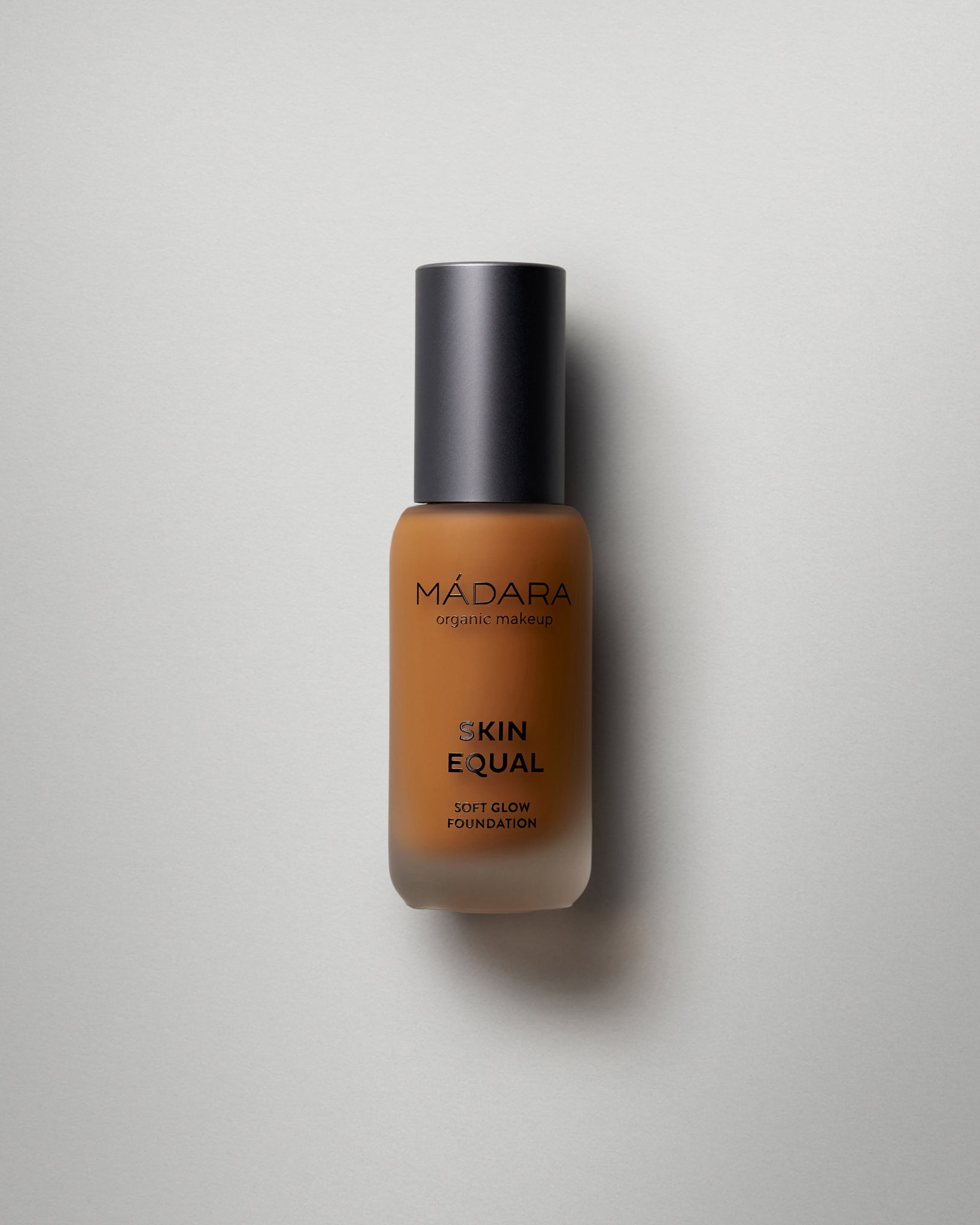 MÁDARA Organic Skincare soft glow foundation fudge A6065 foundation product photo on plain background.