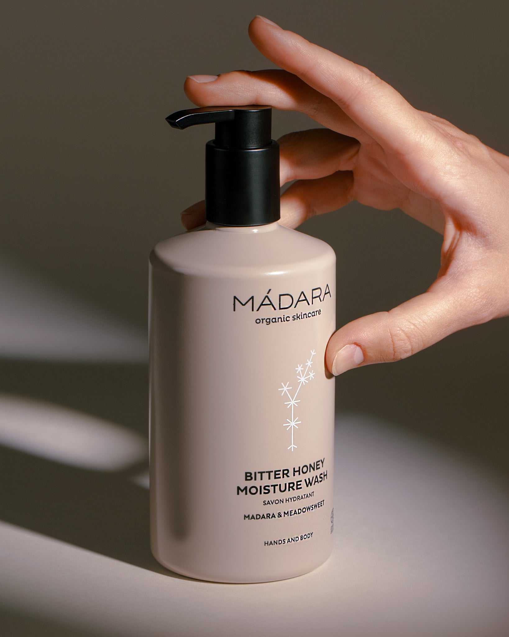 MÁDARA Organic Skincare bitter honey hand and body wash A1082 product photo on plain background.