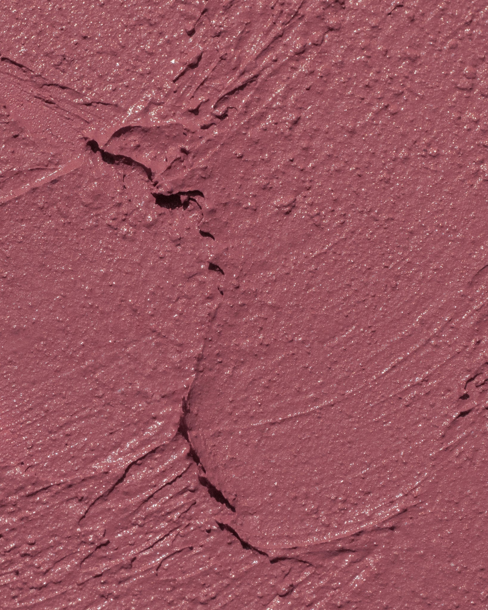 Texture close-up of MÁDARA Organic Skincare cool nude lipstick A6301 �swatch demonstrates consistency and finish.