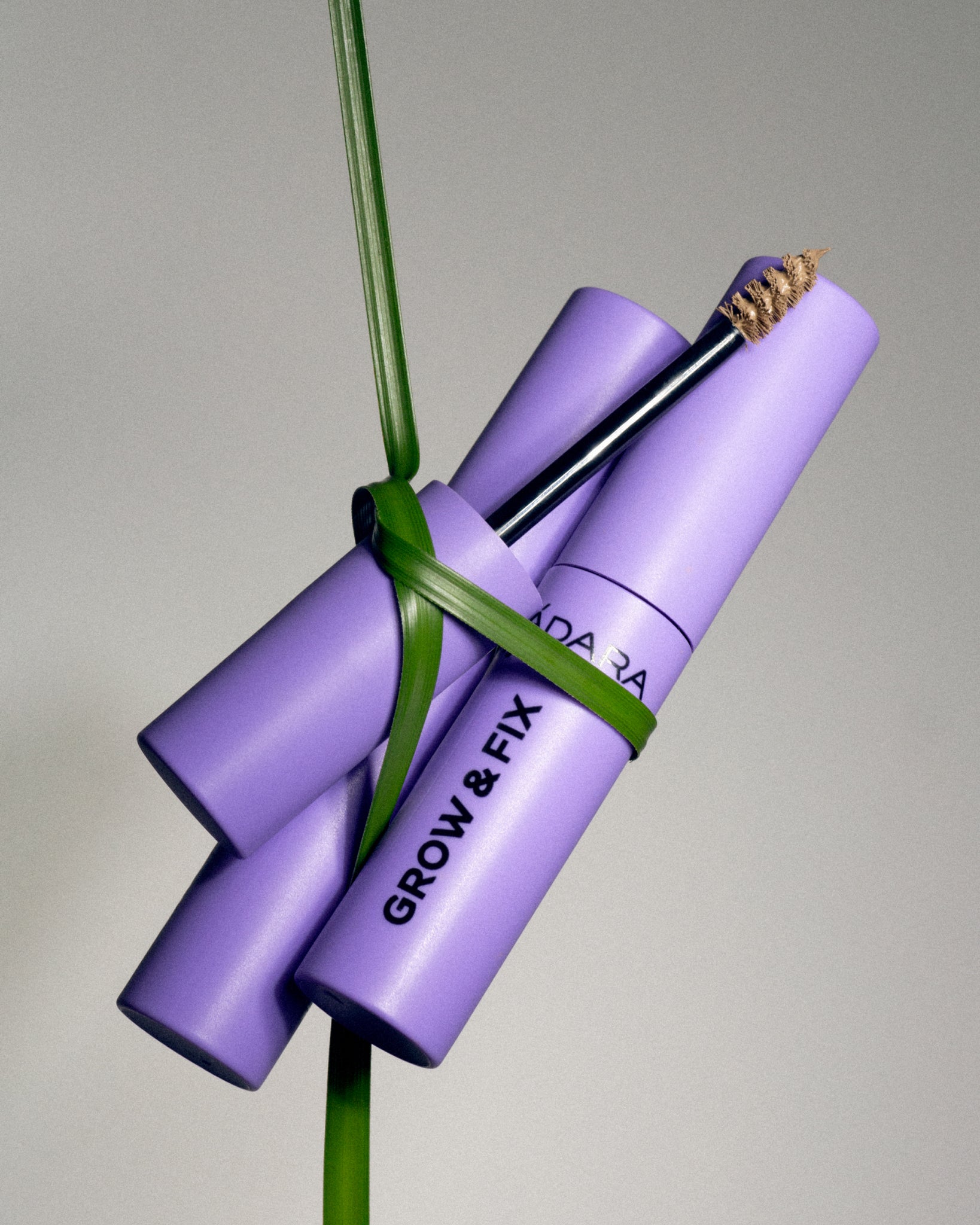 MÁDARA Organic Skincare tinted brow serum A6704 serum product photo on plain background.