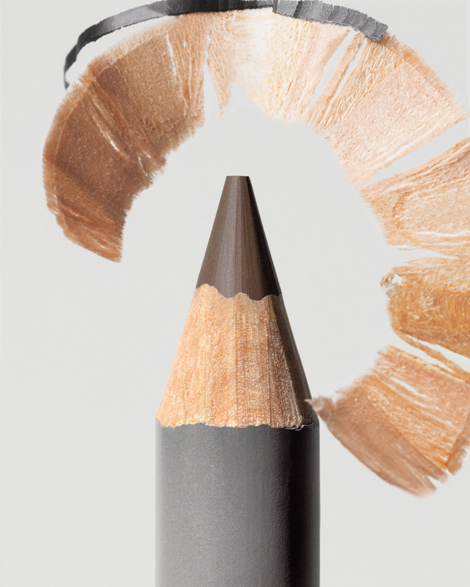 MÁDARA Organic Skincare natural certified brown eye pencil A6882 eye contour care product photo on plain background.