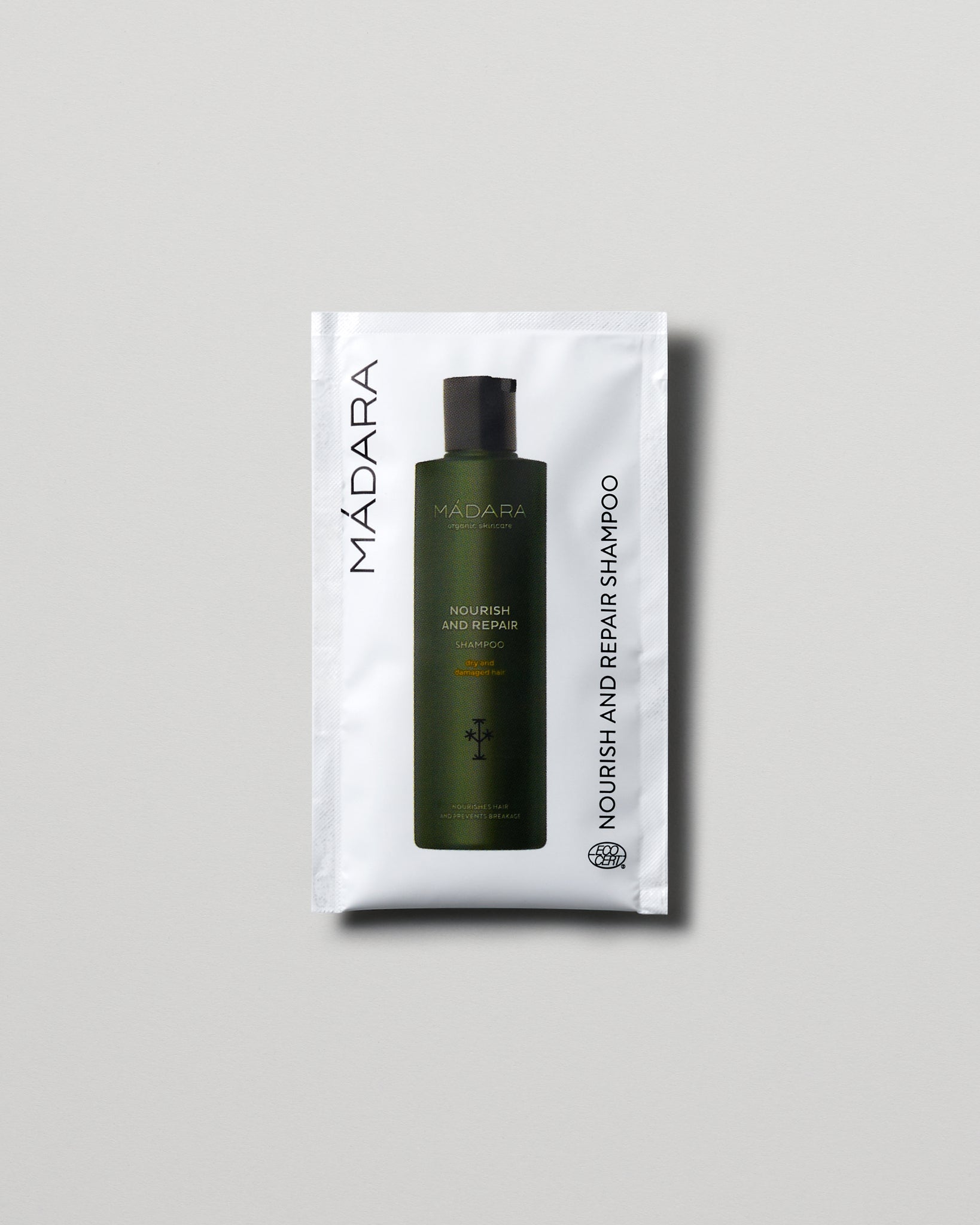 MÁDARA Organic Skincare nourish and repair shampoo 10ml SC4001 10 shampoo product photo on plain background.