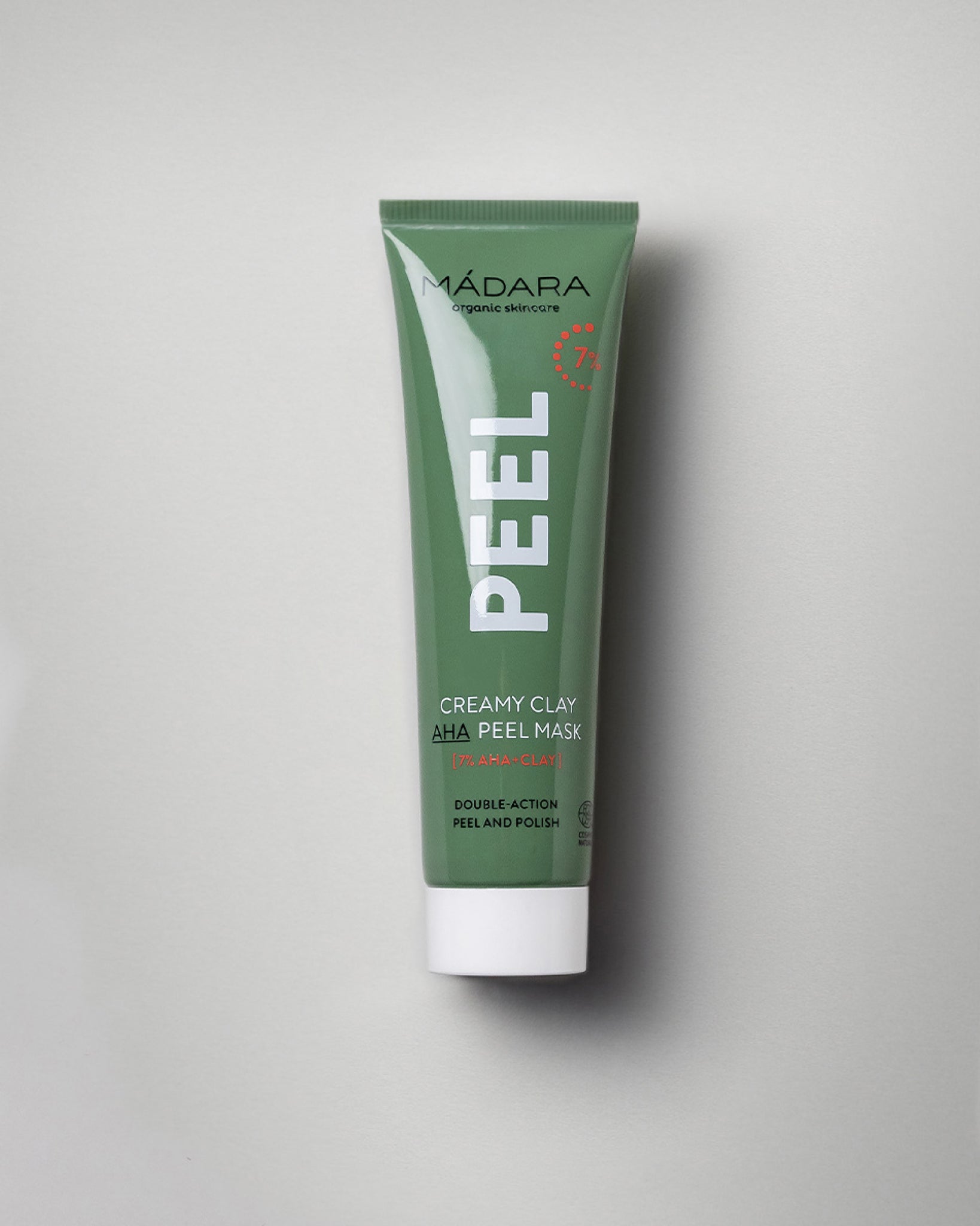 MÁDARA Organic Skincare creamy clay 7 aha peel mask A2105 face mask product photo on plain background.