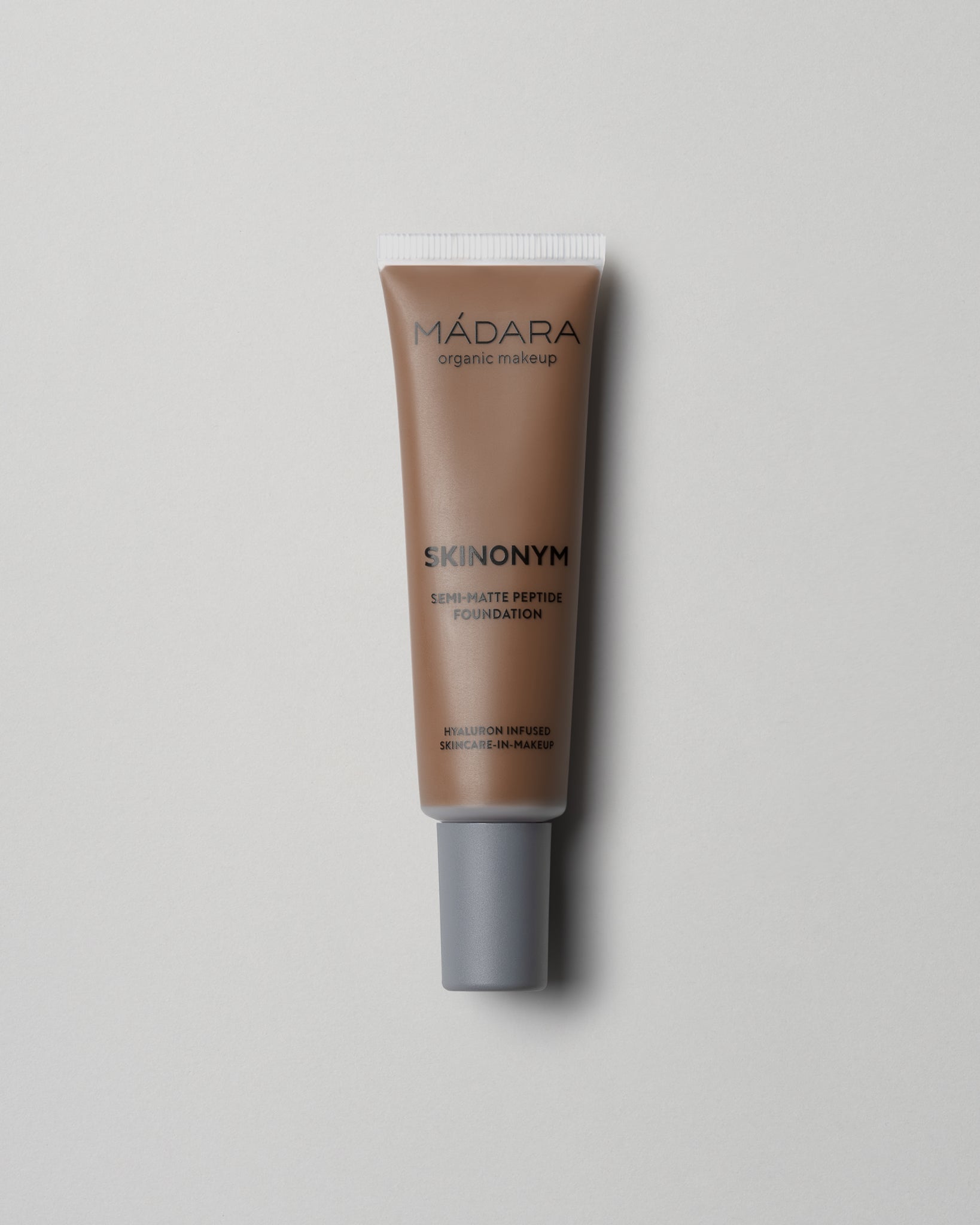 MÁDARA Organic Skincare skinonym foundation caramel A6093 foundation product photo on plain background.
