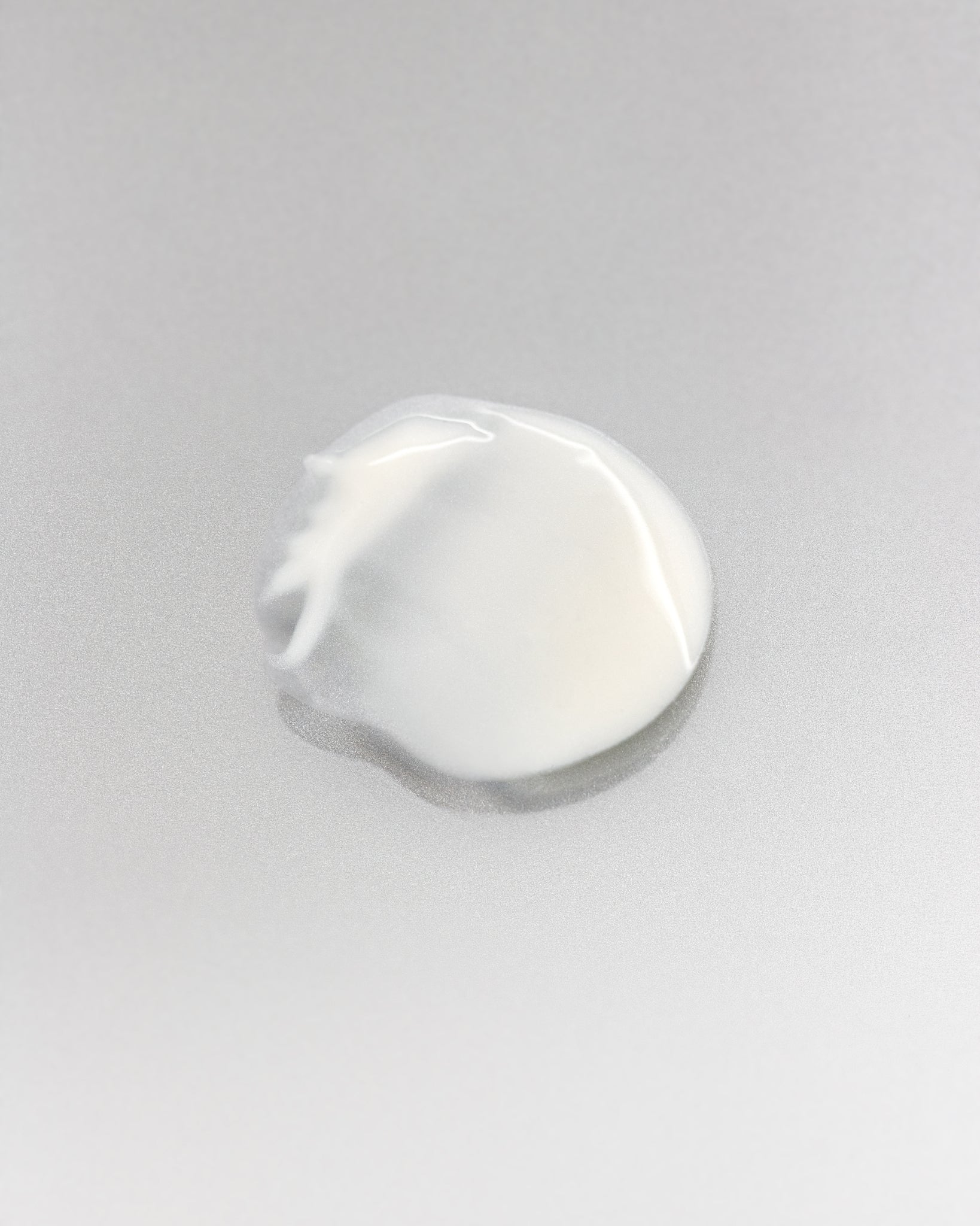 MÁDARA Organic Skincare balancing fluid A2271 product photo on plain background.