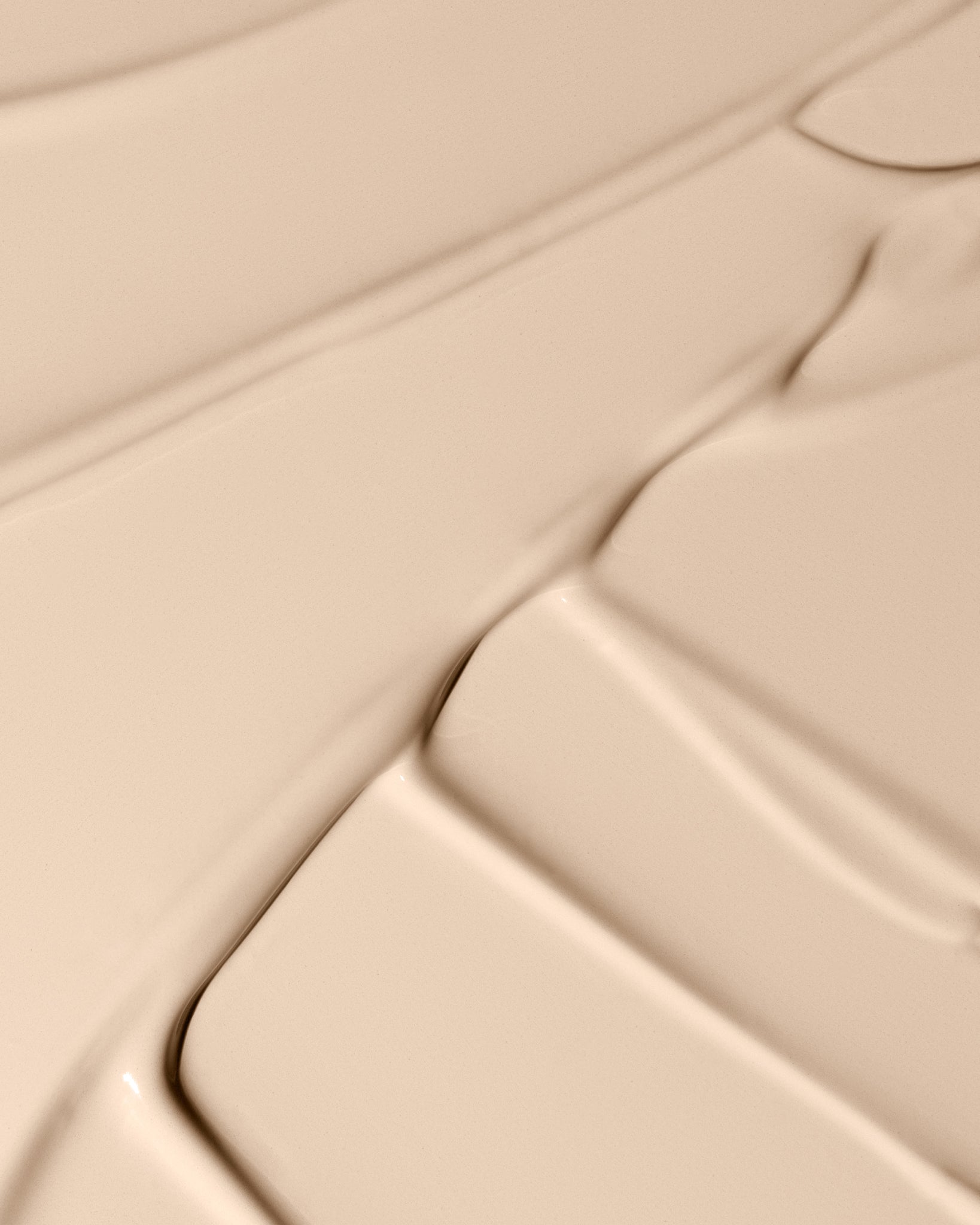 Texture close-up of MÁDARA Organic Skincare skinonym stone A6087 �swatch demonstrates consistency and finish.