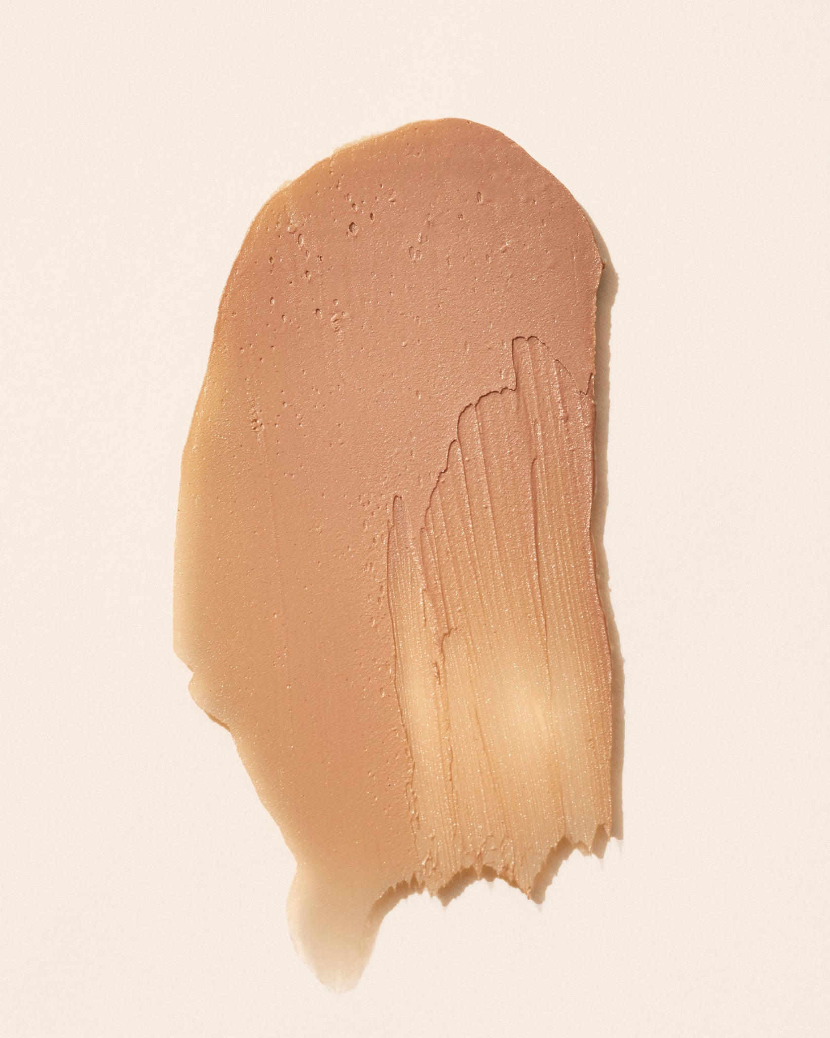 Texture close-up of MÁDARA Organic Skincare spf stick A3433 mineral sunscreen �swatch demonstrates consistency and finish.