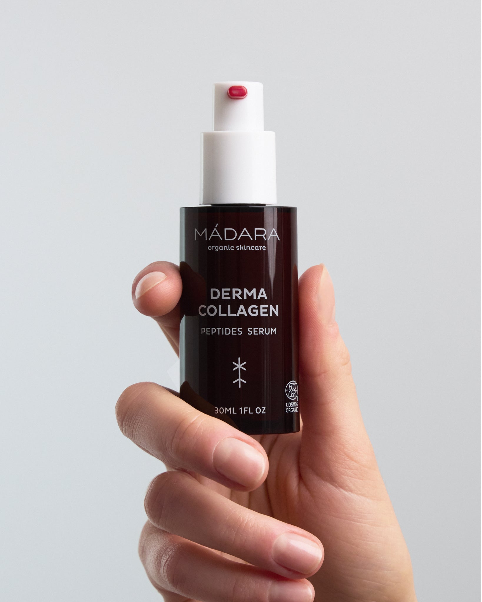 MÁDARA Organic Skincare collagen peptide serum 30ml A3061 serum product photo on plain background.
